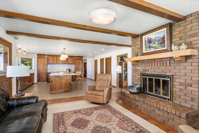 170732 Olsen Rd, Grandview, WA 98930 - living room featuring beam ceiling, a fireplace, and recessed lighting