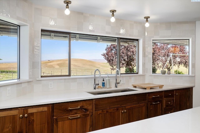 170732 Olsen Rd, Grandview, WA 98930 - kitchen featuring decorative backsplash and light countertops