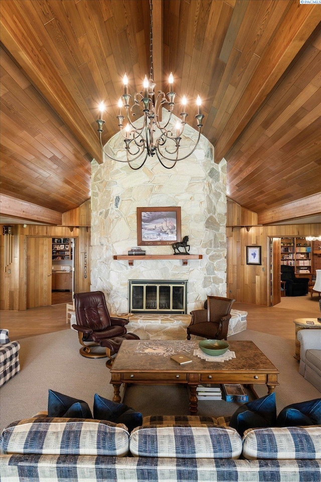 170732 Olsen Rd, Grandview, WA 98930 - living room featuring wood ceiling, wood walls, a fireplace, and a chandelier