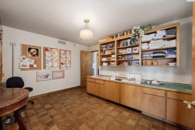 170732 Olsen Rd, Grandview, WA 98930 - kitchen featuring open shelves, light countertops, decorative light fixtures, and an office area