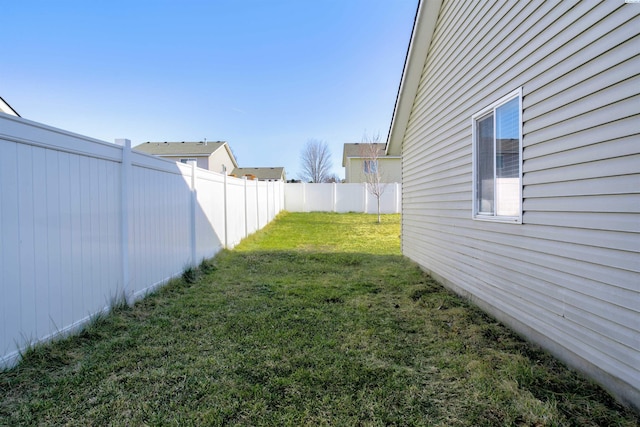 view of yard with fence