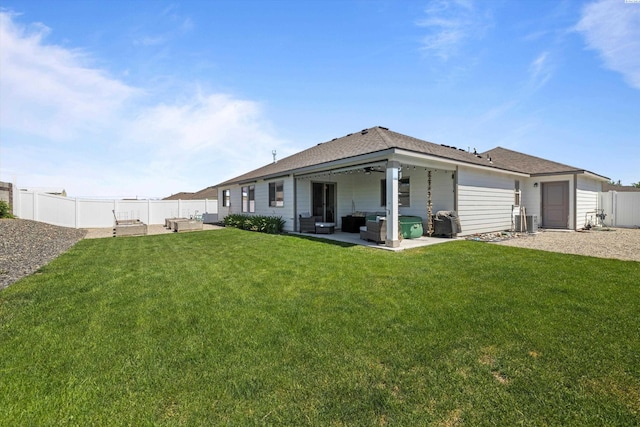 600 Lizzy Ln, Grandview, WA 98930 - back of property featuring outdoor lounge area, a ceiling fan, a patio area, a fenced backyard, and a lawn