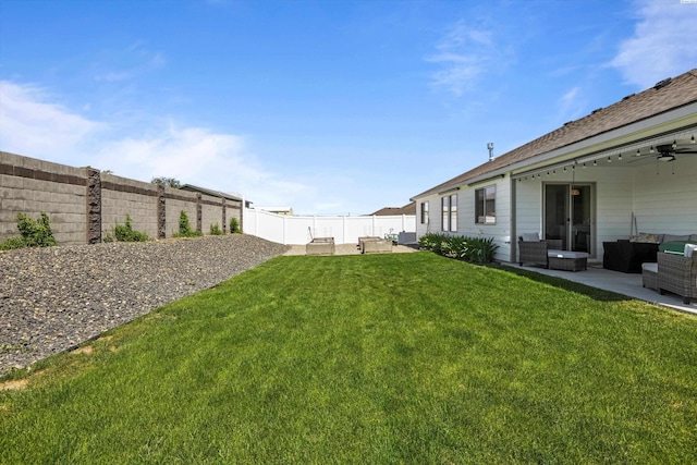 600 Lizzy Ln, Grandview, WA 98930 - view of yard with a patio area, a fenced backyard, ceiling fan, and an outdoor hangout area