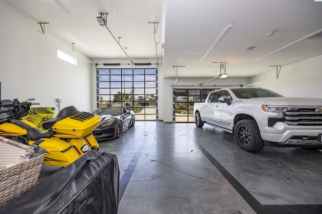 975 Rieve Ct, Richland, WA 99352 - garage featuring a garage door opener