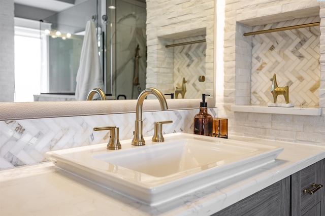975 Rieve Ct, Richland, WA 99352 - bathroom view of vanity and decorative backsplash