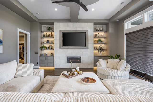 975 Rieve Ct, Richland, WA 99352 - living area featuring wood finished floors, a fireplace, recessed lighting, beam ceiling, and a ceiling fan