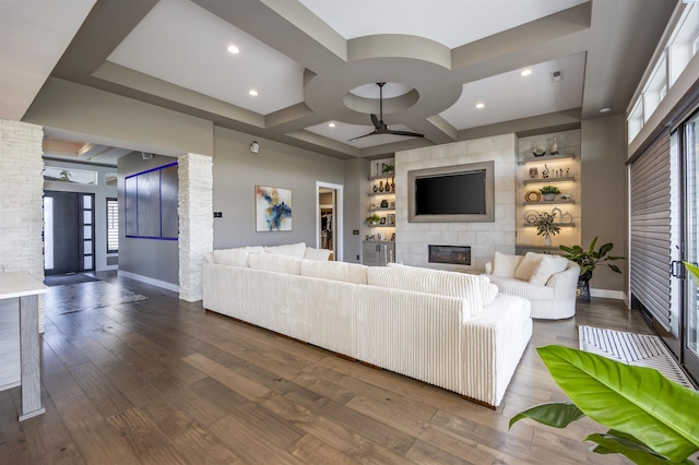 975 Rieve Ct, Richland, WA 99352 - living area featuring a fireplace, coffered ceiling, hardwood / wood-style floors, built in shelves, and recessed lighting