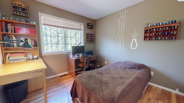 470 NW Robert St, Pullman, WA 99163 - bedroom featuring wood finished floors and a desk