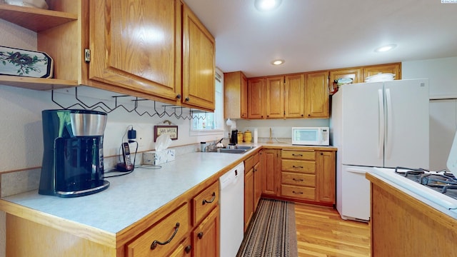 470 NW Robert St, Pullman, WA 99163 - kitchen featuring white appliances, open shelves, light countertops, light wood-style floors, and recessed lighting