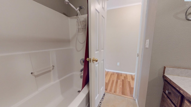 470 NW Robert St, Pullman, WA 99163 - full bathroom with shower / washtub combination, vanity, and wood finished floors