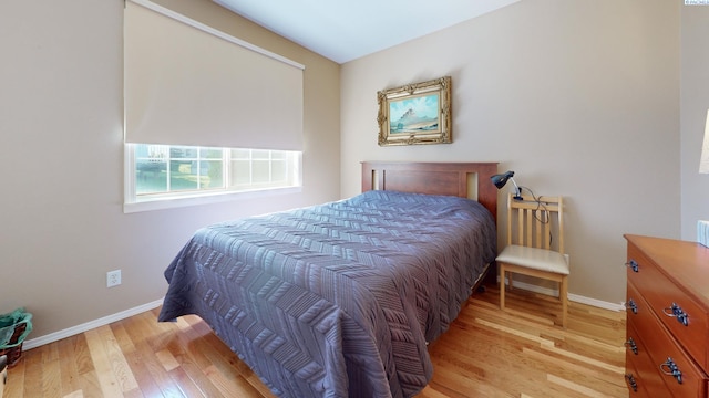470 NW Robert St, Pullman, WA 99163 - bedroom featuring baseboards and light wood finished floors