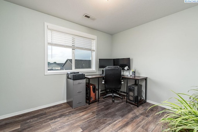 5309 Buchanan Ln, Pasco, WA 99301 - home office with dark wood-style flooring and baseboards