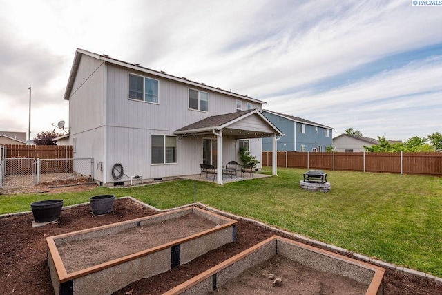5309 Buchanan Ln, Pasco, WA 99301 - rear view of property featuring a garden, a patio area, and crawl space