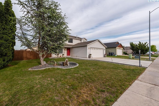 5309 Buchanan Ln, Pasco, WA 99301 - view of front facade featuring driveway and an attached garage
