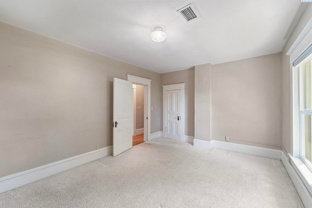 1002 Sherman Ave, Prosser, WA 99350 - unfurnished room featuring light carpet and baseboards