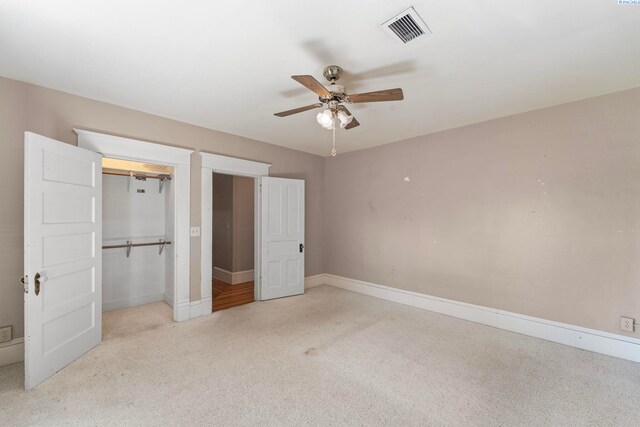 1002 Sherman Ave, Prosser, WA 99350 - unfurnished bedroom featuring carpet floors, a closet, and a ceiling fan