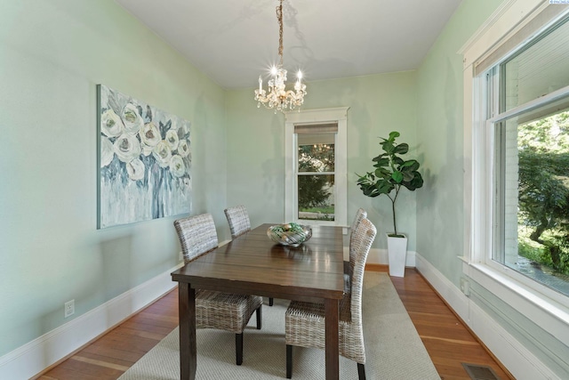1002 Sherman Ave, Prosser, WA 99350 - dining space with a chandelier and wood finished floors