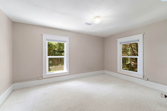 1002 Sherman Ave, Prosser, WA 99350 - spare room featuring carpet flooring and baseboards