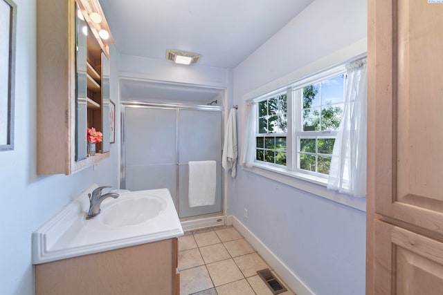 1002 Sherman Ave, Prosser, WA 99350 - bathroom with vanity, an enclosed shower, and tile patterned floors