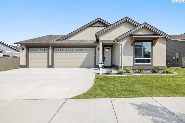 2864 Avrio Ave, Richland, WA 99354 - ranch-style house featuring a garage, stucco siding, and driveway
