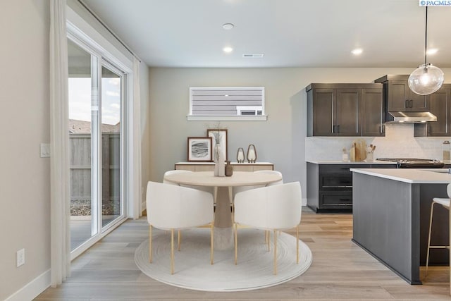 2864 Avrio Ave, Richland, WA 99354 - dining room with light wood finished floors, recessed lighting, and baseboards