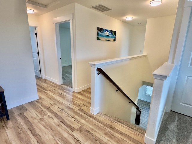 4516 NW Commons Dr, Pasco, WA 99301 - hallway with an upstairs landing and wood finished floors
