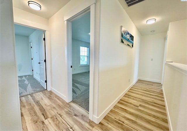 4516 NW Commons Dr, Pasco, WA 99301 - corridor with light wood finished floors and baseboards