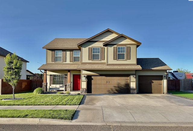 4516 NW Commons Dr, Pasco, WA 99301 - craftsman inspired home featuring driveway, an attached garage, stone siding, and a shingled roof