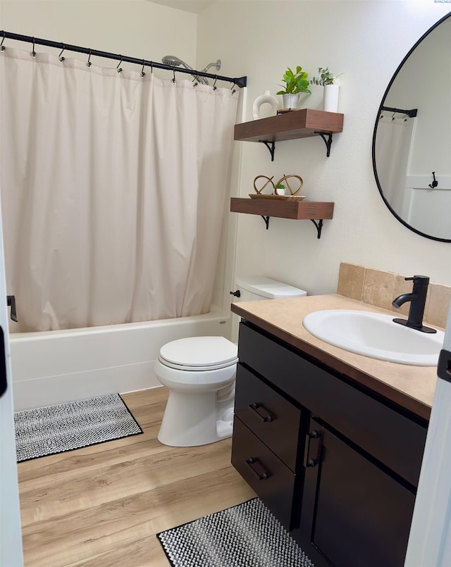 4516 NW Commons Dr, Pasco, WA 99301 - full bath with vanity, shower / tub combo with curtain, and wood finished floors