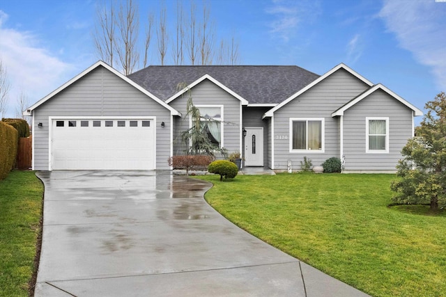 ranch-style home with a garage and a front yard