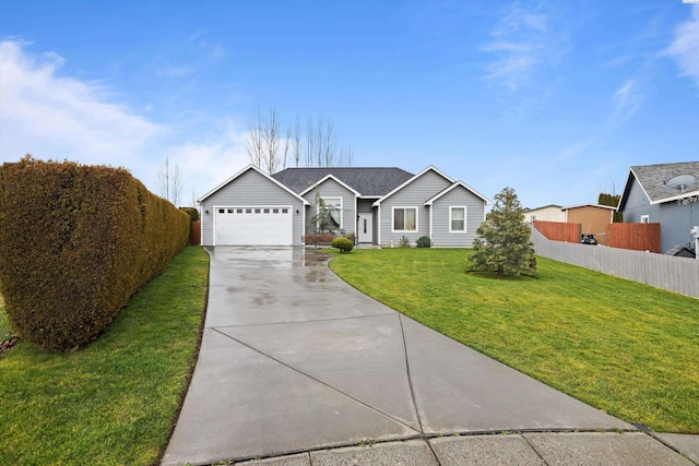 ranch-style home featuring a garage and a front yard