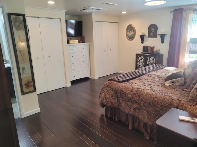 907 Cedar Ave, Richland, WA 99352 - bedroom with multiple closets, baseboards, wood finished floors, recessed lighting, and crown molding