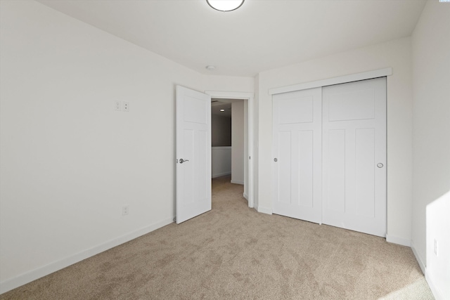 125 Claret Dr, Prosser, WA 99350 - unfurnished bedroom featuring carpet floors, baseboards, and a closet
