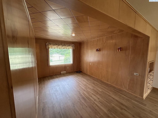 404 D St, Endicott, WA 99125 - empty room with wood finished floors and wood walls