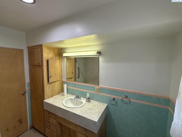 404 D St, Endicott, WA 99125 - bathroom featuring vanity and wainscoting