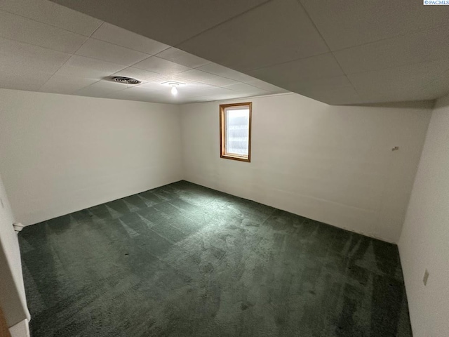 404 D St, Endicott, WA 99125 - basement with dark carpet and a paneled ceiling
