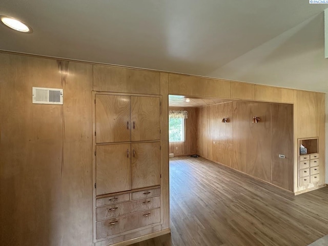 404 D St, Endicott, WA 99125 - spare room featuring wooden walls and wood finished floors