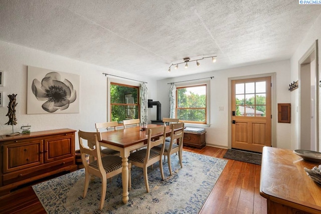 312 NW Harrison St, Pullman, WA 99163 - dining space with hardwood / wood-style floors and a textured ceiling