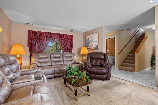 5001 E Killdeer Ct, West Richland, WA 99353 - living room featuring stairway, marble finish flooring, and a textured ceiling