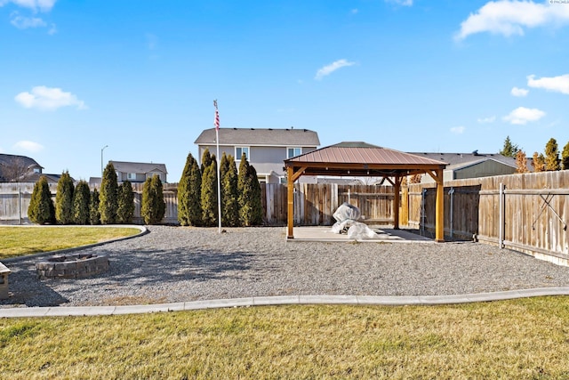 view of home's community featuring a yard, a gazebo, and a patio area