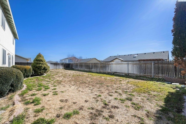 view of yard featuring a fenced backyard