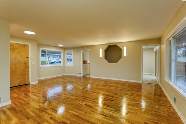 empty room featuring hardwood / wood-style floors