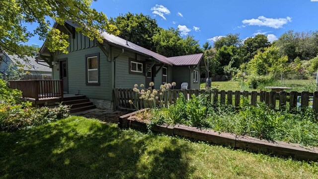 535 SE Side St, Pullman, WA 99163 - back of property featuring a wooden deck and metal roof
