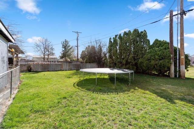1907 Howell Ave, Richland, WA 99353 - view of yard with a trampoline and a fenced backyard