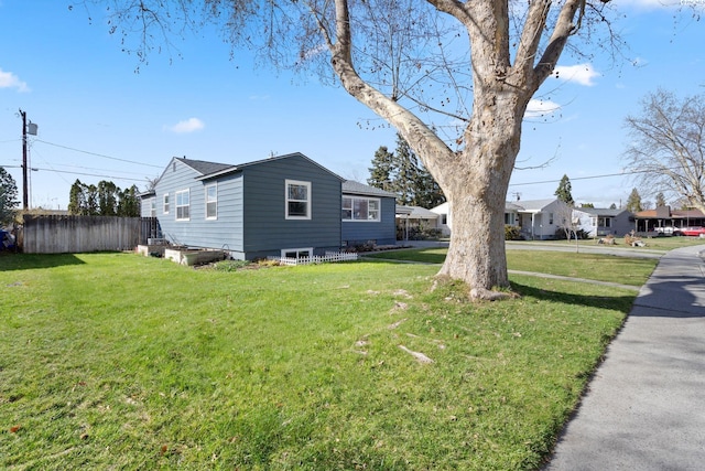 1907 Howell Ave, Richland, WA 99353 - view of home's exterior with a lawn and fence