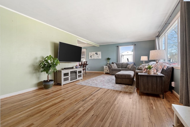 1907 Howell Ave, Richland, WA 99353 - living room with ornamental molding, baseboards, and light wood-type flooring