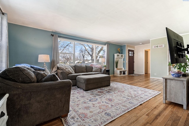 1907 Howell Ave, Richland, WA 99353 - living area featuring baseboards, crown molding, and wood finished floors