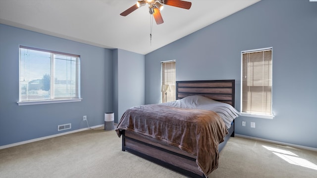 9907 Chelan Ct, Pasco, WA 99301 - carpeted bedroom with vaulted ceiling and a ceiling fan
