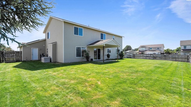 9907 Chelan Ct, Pasco, WA 99301 - rear view of house with a fenced backyard and a patio area