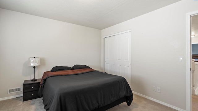 9907 Chelan Ct, Pasco, WA 99301 - bedroom with light carpet and a closet